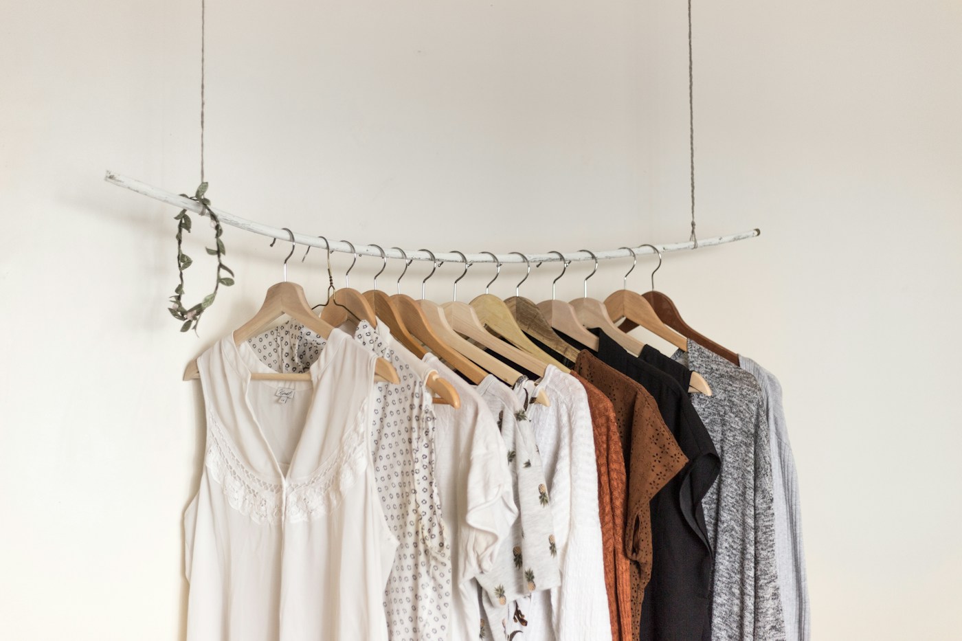 Temporary visual reference: a thoughtfully arranged collection of clothing in soft neutral tones